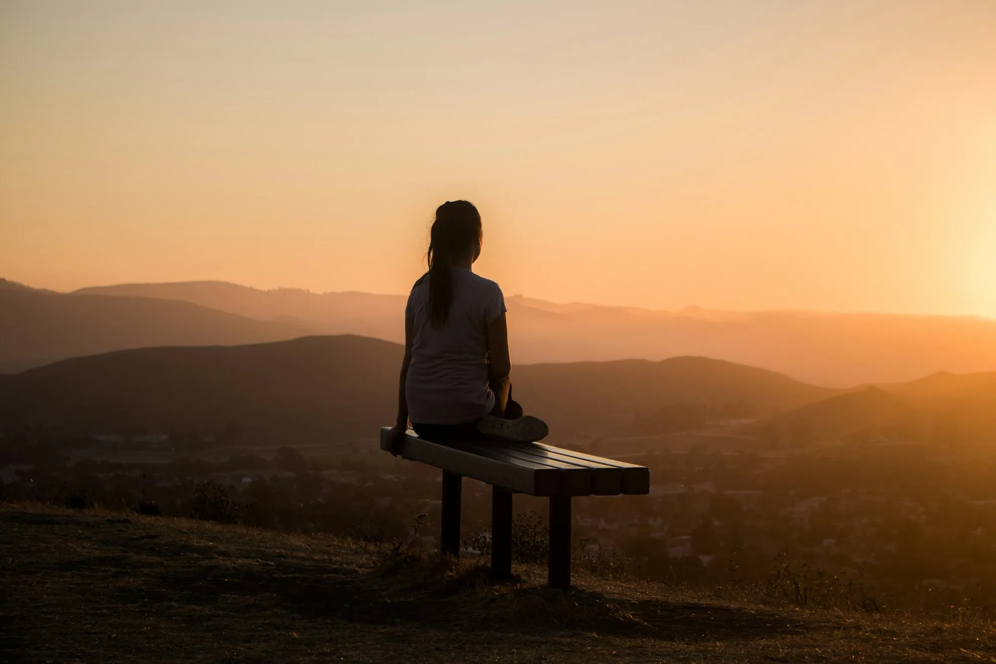 A bench looking over a valley